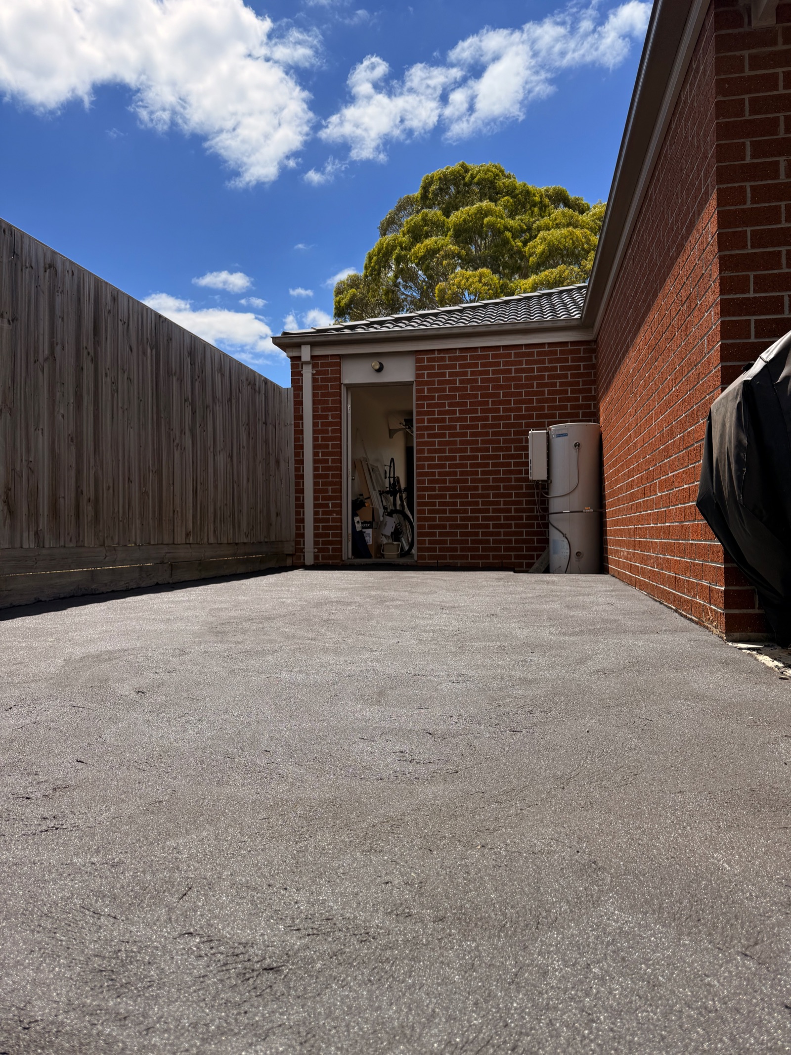 Completed concrete surface in a residential side access