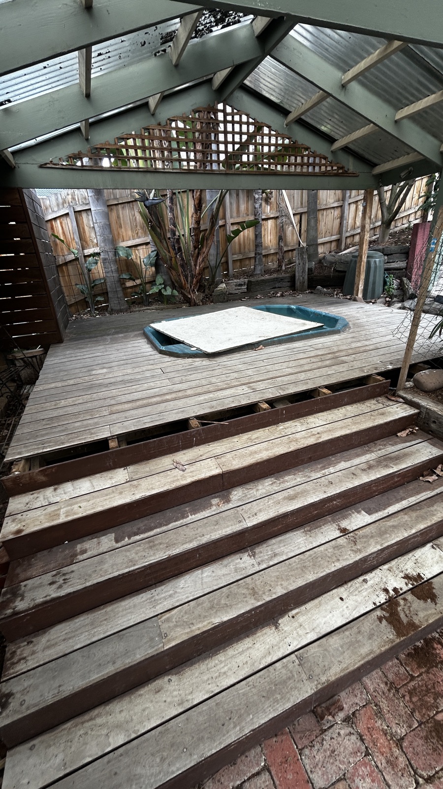Existing timber deck and backyard at Kempston Street before work begins