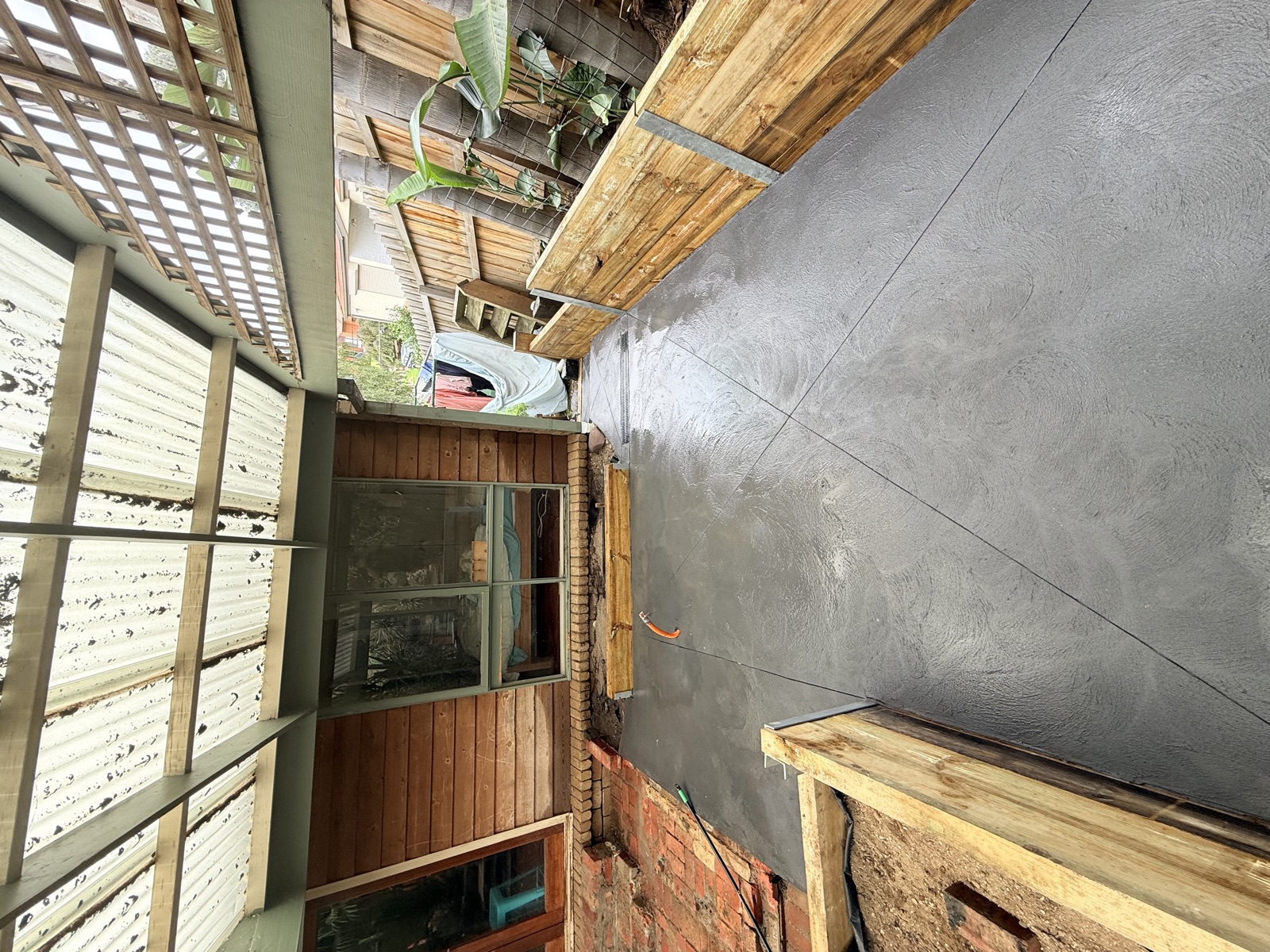 Fresh concrete and timber retaining work at Kempston Street